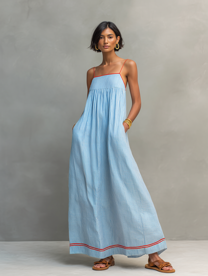 Nora · Vestido azul fluido con bolsillos